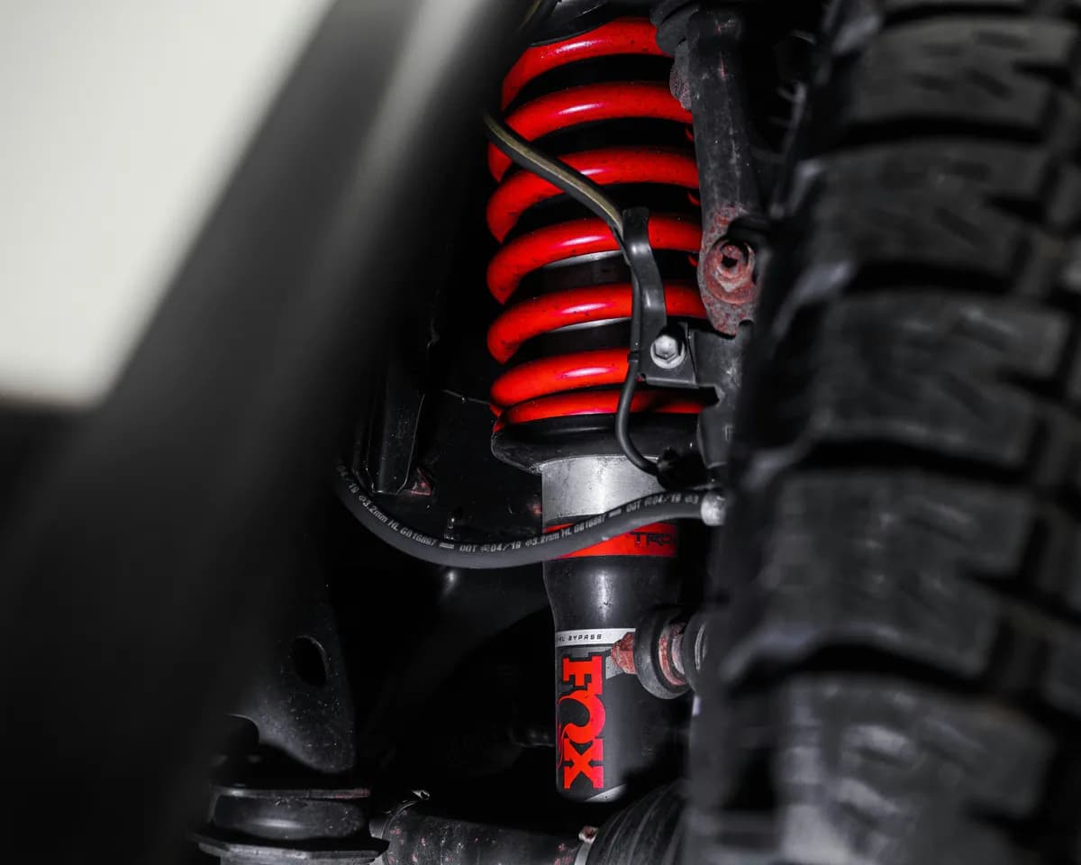 A coilover shock absorber and suspension spring