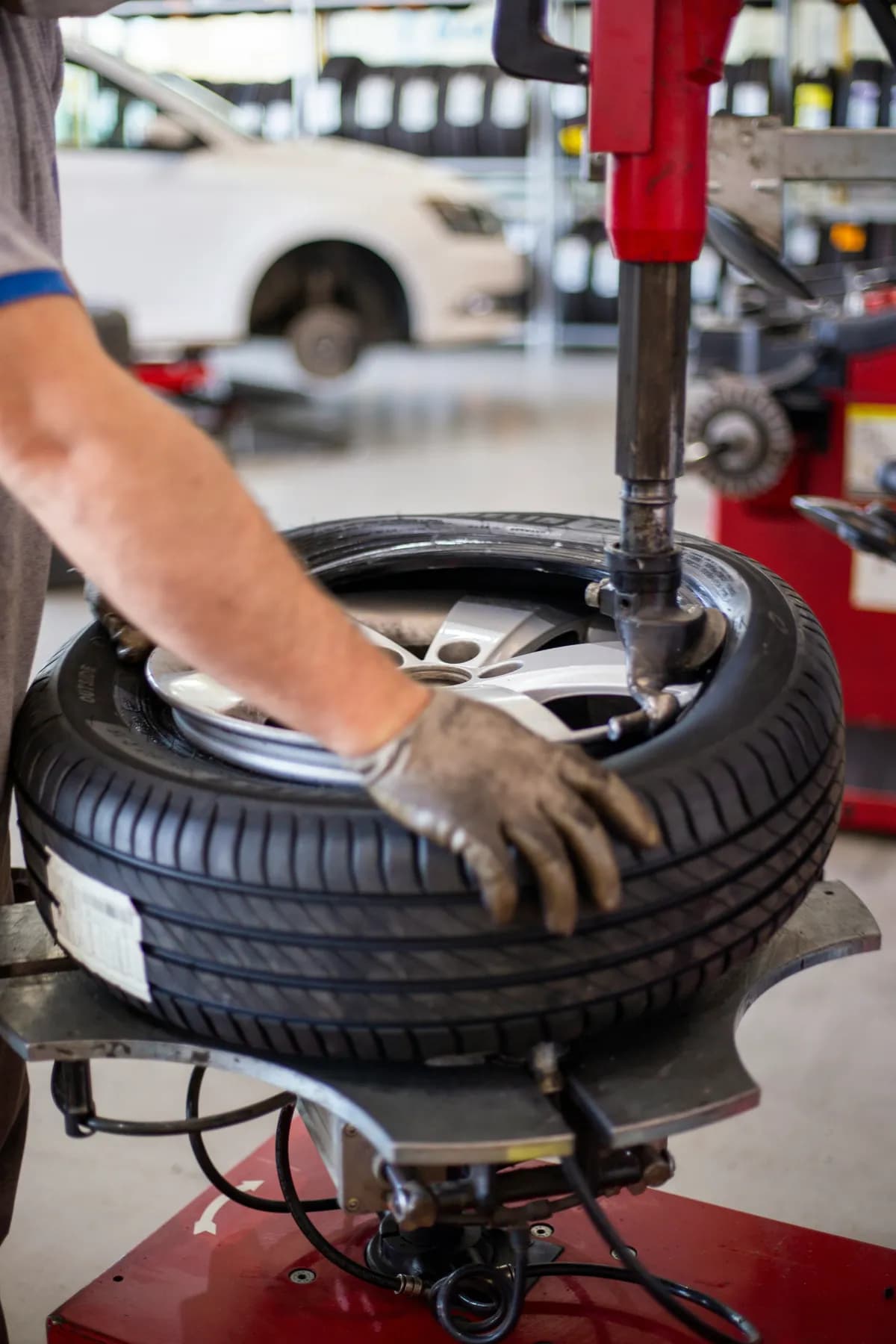 A close view of a car wheel and tyre tread